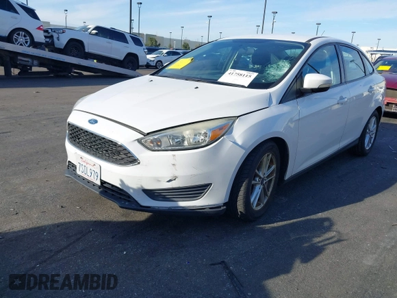 2016 Ford Focus SE with VIN 1FADP3F25GL339312, listed as a IAAI auction lot 41758115 with 77,972 mi miles. Bid and sale history available at carsss.com. Image 6.