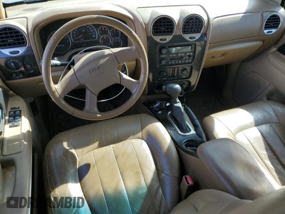 2003 GMC Envoy SLT z VIN 1GKDS13S032134647, wystawiony jako Copart lot #50137325 z przebiegiem 217 878 mil mil oraz Szkody całkowita. Historia ofert i sprzedaży dostępna na DreamBid. Obrazek 8.