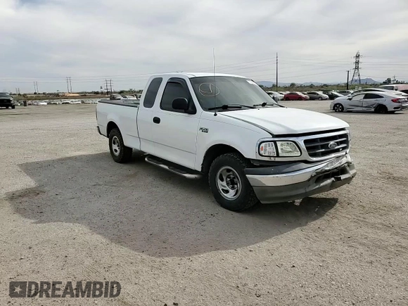 2003 Ford F-150 XL z VIN 1FTRX17233NB92067, wystawiony jako Copart lot #57986555 z przebiegiem 179 101 mil mil oraz Szkoda całkowita • Salvage title. Historia ofert i sprzedaży dostępna na DreamBid. Obrazek 13.