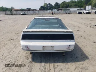 1991 Pontiac Firebird z VIN 1G2FS23E5ML239639, wystawiony jako Copart lot #54986095 z przebiegiem 154 017 mil mil oraz Tytuł czysty. Historia ofert i sprzedaży dostępna na DreamBid. Obrazek 6.