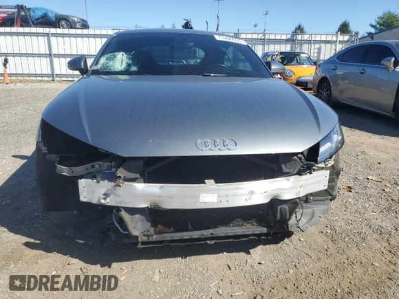 2016 Audi TT 2.0T z VIN TRUC5AFV9G1030454, wystawiony jako Copart lot #75286664 z przebiegiem 77 376 mil mil oraz Szkoda całkowita • Salvage title. Historia ofert i sprzedaży dostępna na DreamBid. Obrazek 5.