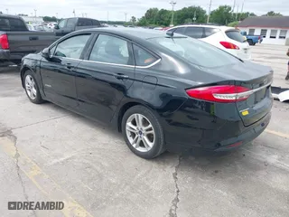2018 Ford Fusion Hybrid SE with VIN 3FA6P0LU9JR286359, listed as a IAAI auction lot 41973064 with 145,267 mi miles. Bid and sale history available at carsss.com. Image 3.
