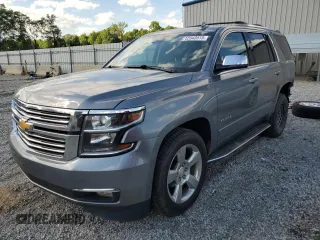 2020 Chevrolet Tahoe Premier with VIN 1GNSKCKC1LR216510, listed as a Copart auction lot 57627705 with 113,495 mi miles and Salvage title. Bid and sale history available at DreamBid. Image 1.