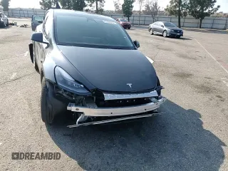 2024 Tesla Model Y Long Range with VIN 7SAYGAEE0RF018427, listed as a Copart auction lot 42455075 with 13,347 mi miles and Salvage Title. Bid and sale history available at DreamBid. Image 10.