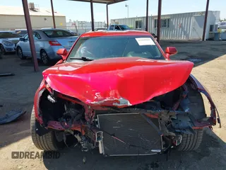 2018 Chevrolet Camaro 1LT z VIN 1G1FB1RS6J0139963, wystawiony jako IAAI lot #41885065 z przebiegiem 45 260 mil mil oraz . Historia ofert i sprzedaży dostępna na DreamBid. Obrazek 6.