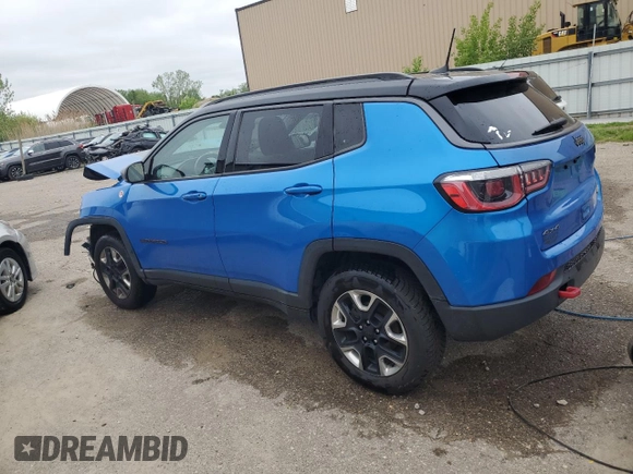 2018 Jeep Compass Trailhawk with VIN 3C4NJDDBXJT139496, listed as a Copart auction lot 57068265 with 105,809 mi miles and Salvage title. Bid and sale history available at DreamBid. Image 2.