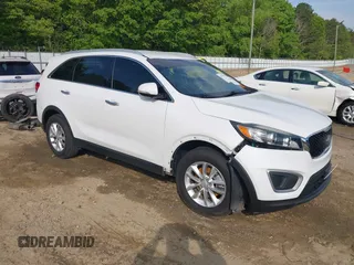 2017 Kia Sorento LX z VIN 5XYPG4A34HG274494, wystawiony jako IAAI lot #42054297 z przebiegiem 107 844 mil mil oraz . Historia ofert i sprzedaży dostępna na DreamBid. Obrazek 1.
