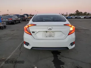 2017 Honda Civic LX with VIN 19XFC2F58HE021715, listed as a Copart auction lot 88125025 with 86,058 mi miles and Salvage Title. Bid and sale history available at DreamBid. Image 6.