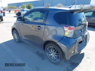 2012 Scion iQ z VIN JTNJJXB00CJ009265, wystawiony jako IAAI lot #41742947 z przebiegiem 95 857 mil mil oraz . Historia ofert i sprzedaży dostępna na DreamBid. Obrazek 3.
