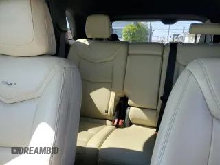 2019 Cadillac XT5 FWD with VIN 1GYKNARS1KZ121732, listed as a Copart auction lot 54882885 with 72,142 mi miles and Salvage title. Bid and sale history available at DreamBid. Image 10.