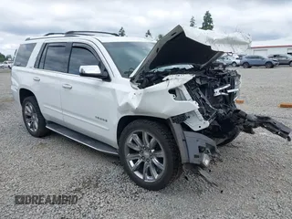 2016 Chevrolet Tahoe LTZ with VIN 1GNSKCKC1GR207344, listed as a IAAI auction lot 42427043 with Not provided miles and . Bid and sale history available at DreamBid. Image 1.