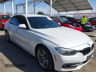 2017 BMW 3 Series 330i with VIN WBA8B9G51HNU51145, listed as a IAAI auction lot 41690107 with 114,555 mi miles. Bid and sale history available at carsss.com. Image 1.