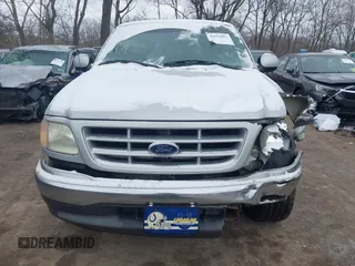 2002 Ford F-150 XL with VIN 1FTRX17212NA45843, listed as a IAAI auction lot 41575856 with 136,570 mi miles. Bid and sale history available at carsss.com. Image 12.