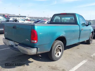 1998 Ford F-150 with VIN 1FTZF1723WNC12776, listed as a IAAI auction lot 41599872 with 125,007 mi miles and . Bid and sale history available at DreamBid. Image 4.