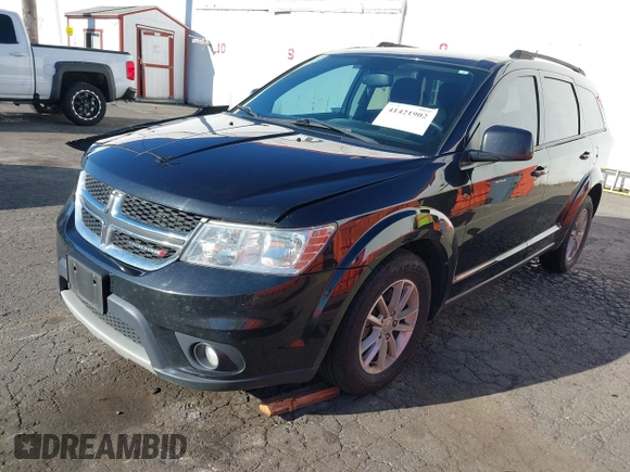 2013 Dodge Journey SXT with VIN 3C4PDCBGXDT589405, listed as a IAAI auction lot 41421902 with 152,964 mi miles and . Bid and sale history available at DreamBid. Image 2.