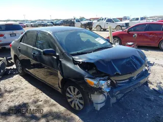 2013 Toyota Corolla L with VIN 5YFBU4EEXDP086518, listed as a IAAI auction lot 41654757 with 151,913 mi miles. Bid and sale history available at carsss.com. Image 1.