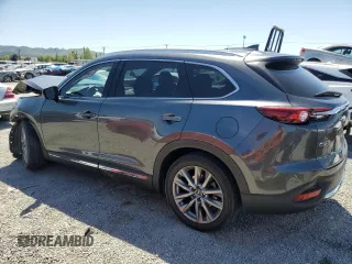 2021 Mazda CX-9 Carbon Edition with VIN JM3TCADYXM0519399, listed as a Copart auction lot 52714565 with 72,765 mi miles and Salvage title. Bid and sale history available at DreamBid. Image 2.