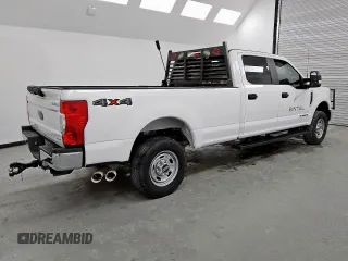 2022 Ford F-250 XL with VIN 1FT7W2BT3NEC38239, listed as a Copart auction lot 63423635 with 104,967 mi miles and Clean title. Bid and sale history available at DreamBid. Image 3.