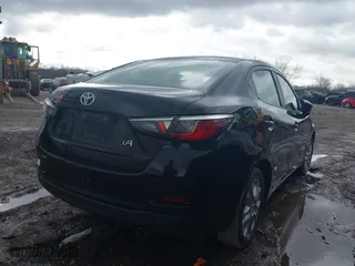 2017 Toyota Yaris iA with VIN 3MYDLBYV6HY190569, listed as a IAAI auction lot 41497732 with 138,221 mi miles. Bid and sale history available at carsss.com. Image 4.