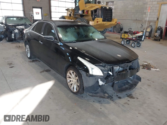 2014 Cadillac CTS Luxury AWD with VIN 1G6AX5S31E0143179, listed as a IAAI auction lot 41421639 with 135,810 mi miles and . Bid and sale history available at DreamBid. Image 1.