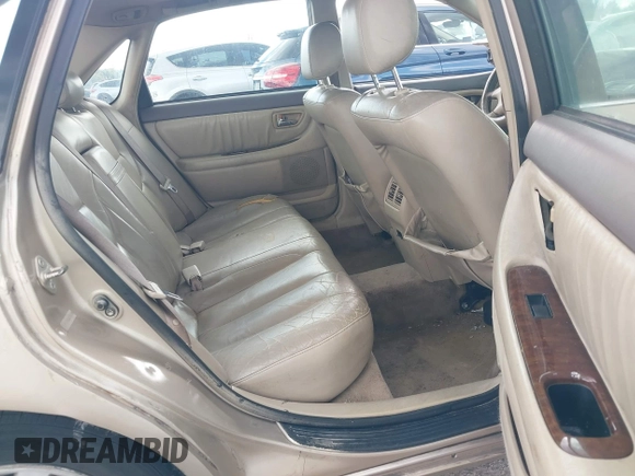 2001 Toyota Avalon XL with VIN 4T1BF28B41U163863, listed as a IAAI auction lot 41679620 with 312,264 mi miles and . Bid and sale history available at DreamBid. Image 8.