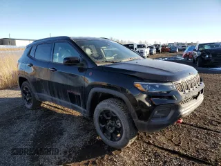 2023 Jeep Compass Trailhawk with VIN 3C4NJDDN0PT534869, listed as a Copart auction lot 46586015 with 3,803 mi miles and Salvage title. Bid and sale history available at DreamBid. Image 4.
