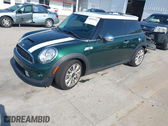 2012 MINI Hardtop S with VIN WMWSV3C50CT388026, listed as a IAAI auction lot 42093542 with 51,308 mi miles and . Bid and sale history available at DreamBid. Image 2.
