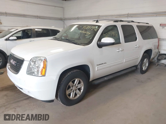 2013 GMC Yukon XL SLT with VIN 1GKS2KE70DR273126, listed as a IAAI auction lot 42147902 with 233,032 mi miles. Bid and sale history available at carsss.com. Image 17.