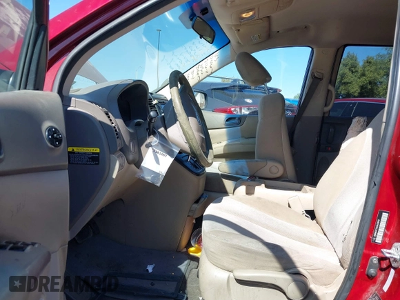 2012 Kia Sedona LX with VIN KNDMG4C70C6443649, listed as a IAAI auction lot 41662007 with 208,575 mi miles. Bid and sale history available at carsss.com. Image 5.