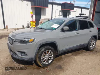 2020 Jeep Cherokee Latitude Plus with VIN 1C4PJMLB1LD608591, listed as a IAAI auction lot 41833275 with 90,838 mi miles and . Bid and sale history available at DreamBid. Image 2.