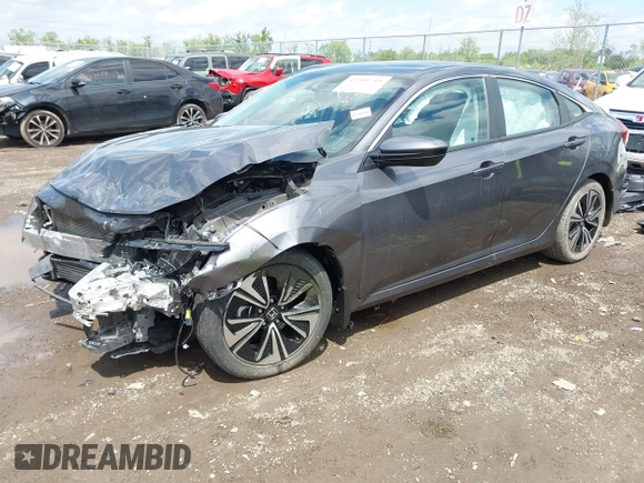 2018 Honda Civic EX-T z VIN 2HGFC1F34JH643975, wystawiony jako IAAI lot #42209799 z przebiegiem 58 684 mil mil oraz . Historia ofert i sprzedaży dostępna na DreamBid. Obrazek 17.