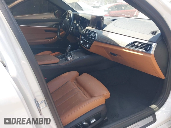 2018 BMW 5 Series 530e with VIN WBAJA9C58JB252868, listed as a IAAI auction lot 42323949 with 100,530 mi miles and . Bid and sale history available at DreamBid. Image 5.