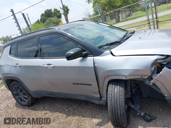 2023 Jeep Compass Latitude with VIN 3C4NJDBN5PT509999, listed as a IAAI auction lot 42206354 with 62,165 mi miles and . Bid and sale history available at DreamBid. Image 13.