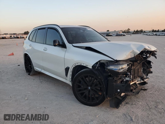 2024 BMW X5 M60i with VIN 5UX33EU07R9T12139, listed as a Copart auction lot 77326454 with 0 mi miles and Salvage Title. Bid and sale history available at carsss.com. Image 4.