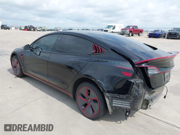 2023 Tesla Model 3 z VIN 5YJ3E1EA5PF484040, wystawiony jako IAAI lot #42128327 z przebiegiem 51 210 mil mil oraz . Historia ofert i sprzedaży dostępna na DreamBid. Obrazek 3.