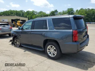 2020 Chevrolet Tahoe LT with VIN 1GNSKBKC0LR260766, listed as a Copart auction lot 61465725 with 104,850 mi miles and Salvage title. Bid and sale history available at DreamBid. Image 2.