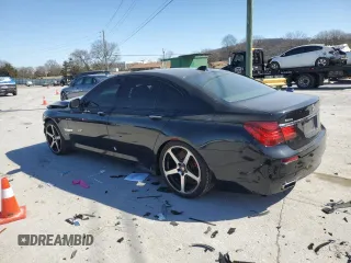 2015 BMW 7 Series 750i xDrive с VIN WBAYB6C56FD965984, выставлен на аукционе Copart как лот 47953045 с пробегом 80 025 миль миль и Списание • Salvage title. История ставок и продаж доступна на DreamBid. Изображение 2.