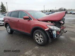 2014 Mazda CX-9 Touring with VIN JM3TB3CA7E0433875, listed as a Copart auction lot 84949564 with 156,988 mi miles and Non Repairable. Bid and sale history available at DreamBid. Image 4.