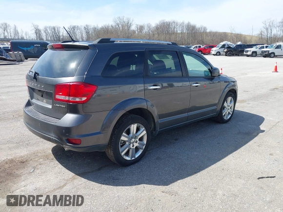 2014 Dodge Journey Limited with VIN 3C4PDDDG7ET138601, listed as a IAAI auction lot 42021766 with 214,220 mi miles and . Bid and sale history available at carsss.com. Image 4.
