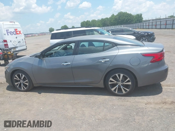2017 Nissan Maxima SR with VIN 1N4AA6AP1HC371670, listed as a IAAI auction lot 42658517 with 273,530 mi miles and . Bid and sale history available at DreamBid. Image 14.