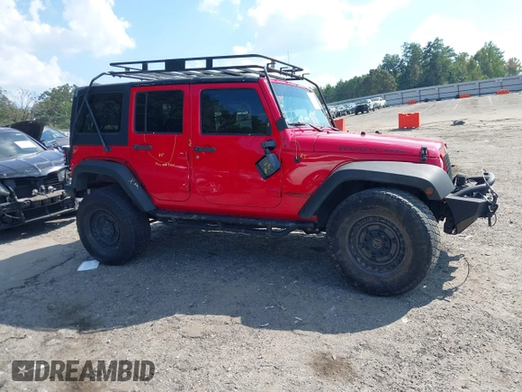 2016 Jeep Wrangler Unlimited Rubicon with VIN 1C4HJWFG7GL128994, listed as a IAAI auction lot 40503403 with 85,950 mi miles. Bid and sale history available at carsss.com. Image 13.