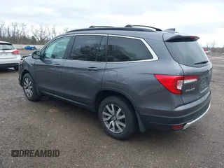 2020 Honda Pilot EX-L z VIN 5FNYF6H53LB059294, wystawiony jako IAAI lot #41910511 z przebiegiem 55 737 mil mil oraz . Historia ofert i sprzedaży dostępna na DreamBid. Obrazek 3.
