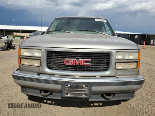1998 GMC Suburban with VIN 1GKFK16RXWJ721305, listed as a Copart auction lot 64112165 with 197,756 mi miles and Clean title. Bid and sale history available at DreamBid. Image 5.