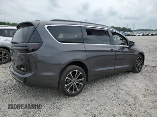 2021 Chrysler Pacifica Touring with VIN 2C4RC1FGXMR550164, listed as a Copart auction lot 57297585 with 10,222 mi miles and Salvage title. Bid and sale history available at DreamBid. Image 3.