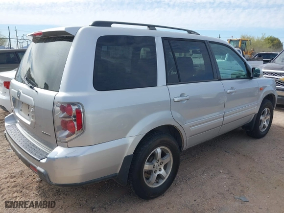 2006 Honda Pilot EX with VIN 2HKYF184X6H519132, listed as a IAAI auction lot 42030952 with 256,094 mi miles. Bid and sale history available at carsss.com. Image 4.