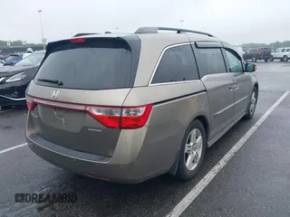 2012 Honda Odyssey Touring с VIN 5FNRL5H98CB060421, выставлен на аукционе IAAI как лот 42378822 с пробегом 249 128 миль миль и . История ставок и продаж доступна на DreamBid. Изображение 4.