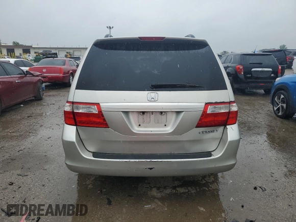 2005 Honda Odyssey EX with VIN 5FNRL38415B410659, listed as a Copart auction lot 58535455 with 198,250 mi miles and Salvage title. Bid and sale history available at DreamBid. Image 6.