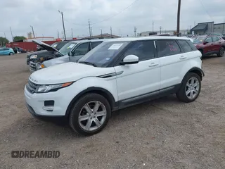 2015 Land Rover Range Rover Evoque Pure Plus with VIN SALVP2BGXFH035350, listed as a IAAI auction lot 42072218 with 122,881 mi miles and . Bid and sale history available at DreamBid. Image 2.