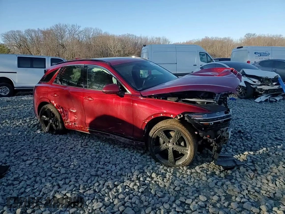 2022 Genesis GV70 Sport with VIN KMUMCDTC6NU022071, listed as a Copart auction lot 88874765 with 57,204 mi miles and Salvage title. Bid and sale history available at DreamBid. Image 11.