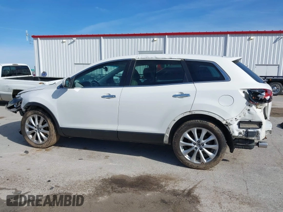 2014 Mazda CX-9 Grand Touring with VIN JM3TB3DA8E0427369, listed as a IAAI auction lot 41860129 with 152,888 mi miles and . Bid and sale history available at DreamBid. Image 15.